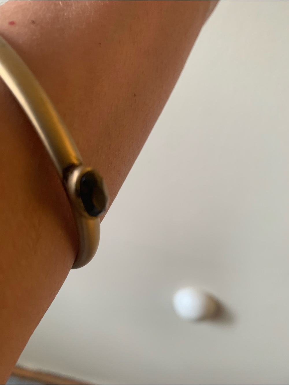 Classic Gold Tone Bangle Bracelet with Black Stone